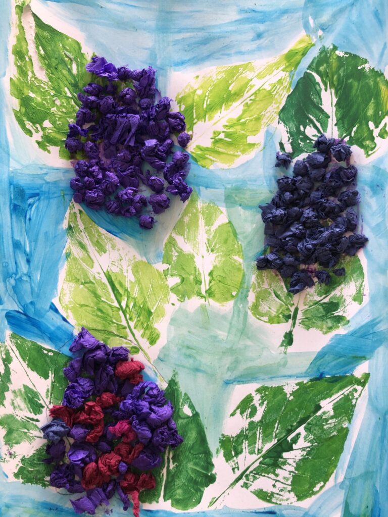 Plakat przedstawia pracę plastyczną wykonaną przez ucznia. Na pracy widzimy fioletowe bzy z zielonymi liśćmi